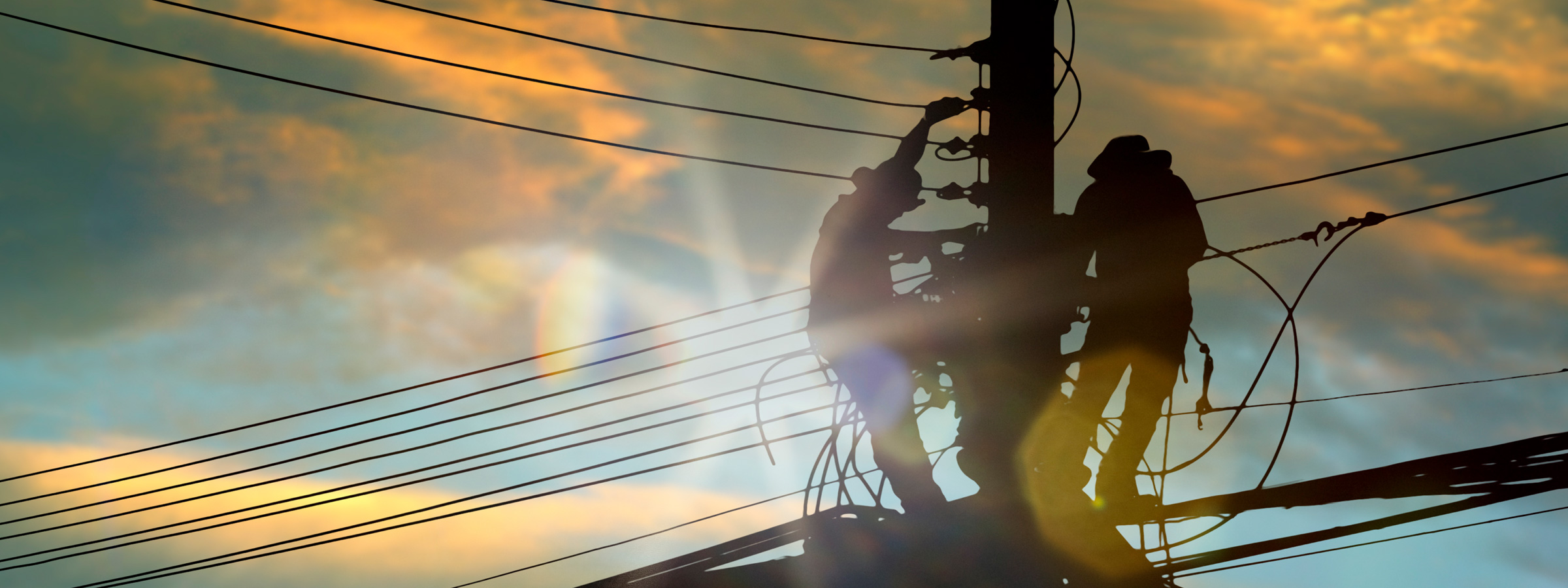 electrical-workers-repairing-powerlines-on-pole