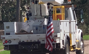 valiant bucket truck with american flag