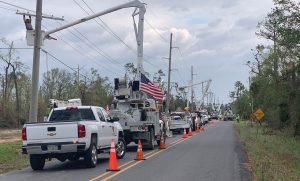 valiant bucket trucks repairing powerlines