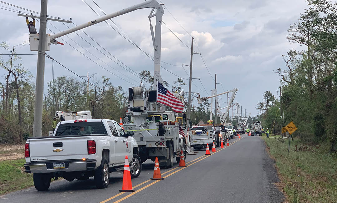 valiant bucket trucks repairing powerlines