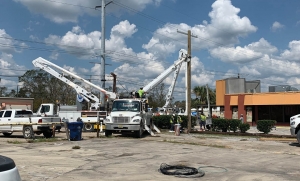 valiant bucket trucks working in town
